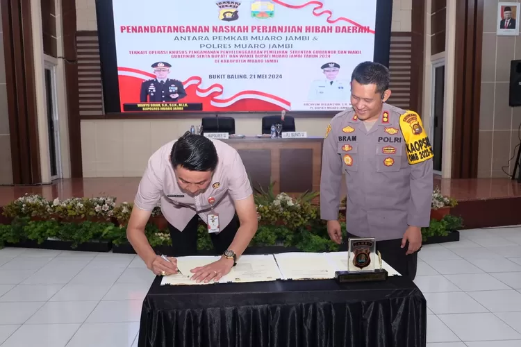 Pj Bupati Muaro Jambi Tanda Tangani Nphd Pengamanan Pilkada