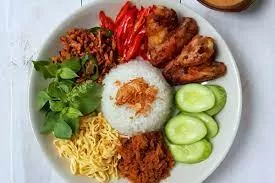 Hidangan Nasi Uduk/https://www.astronauts.id/blog/wp-content/uploads/2023/03/Resep-Rendang-Daging-Sapi-Untuk-Lebaran-Gurih-dan-Nikmat-1024x683.jpg