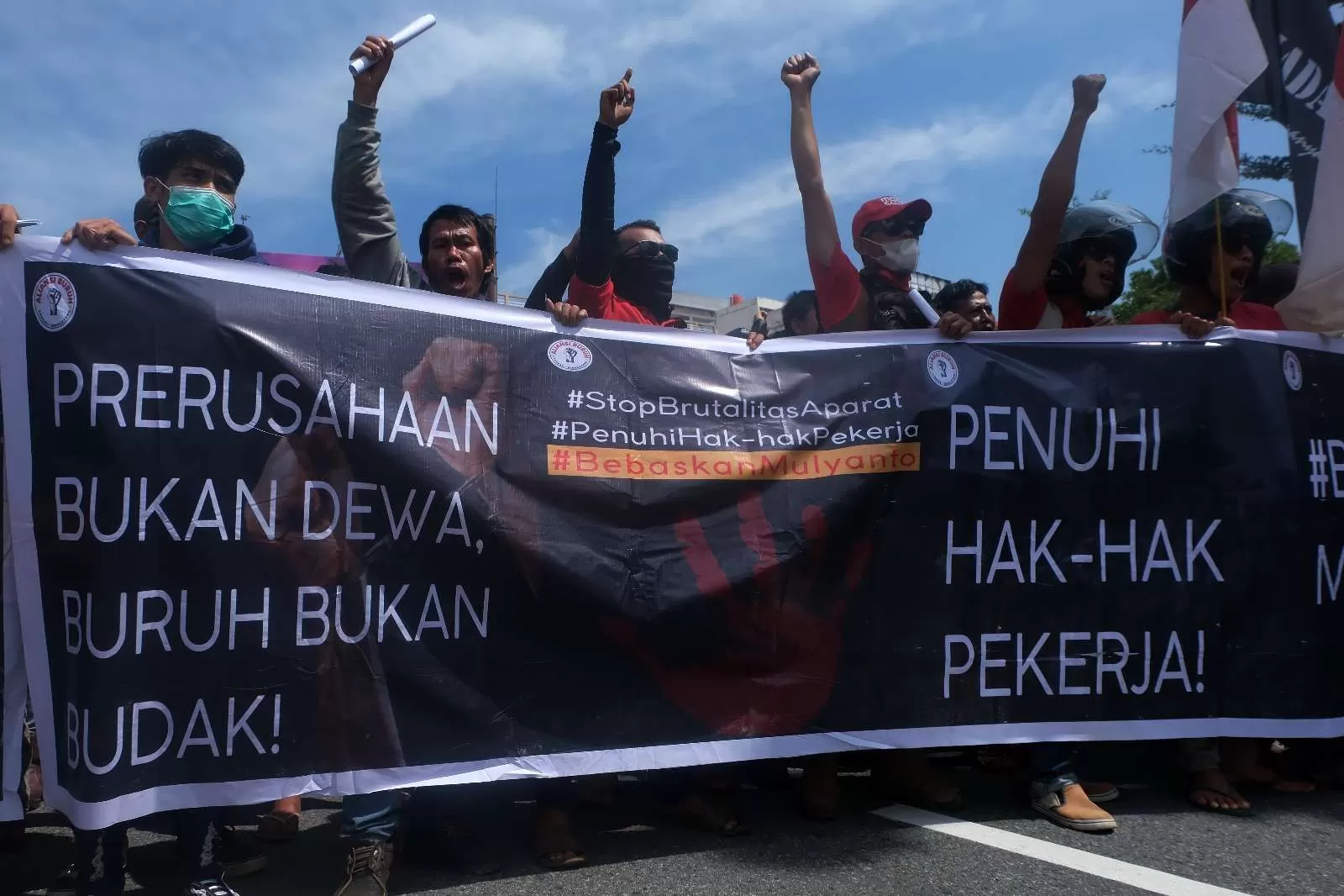 Ilustrasi buruh yang sedang melakukan aksi demo/IST