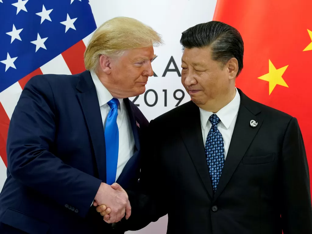 Donald Trump bersama Xi Jinping. (Reuters/Kevin Lamarque)