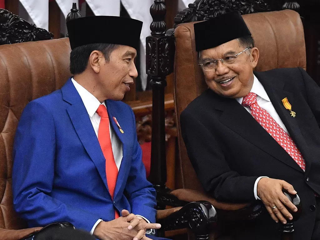 Presiden Joko Widodo dan Wakil Presiden Jusuf Kalla saat menghadiri Sidang Tahunan MPR, Jumat (16/8/2019)(ANTARA FOTO/Sigid Kurniawan)
