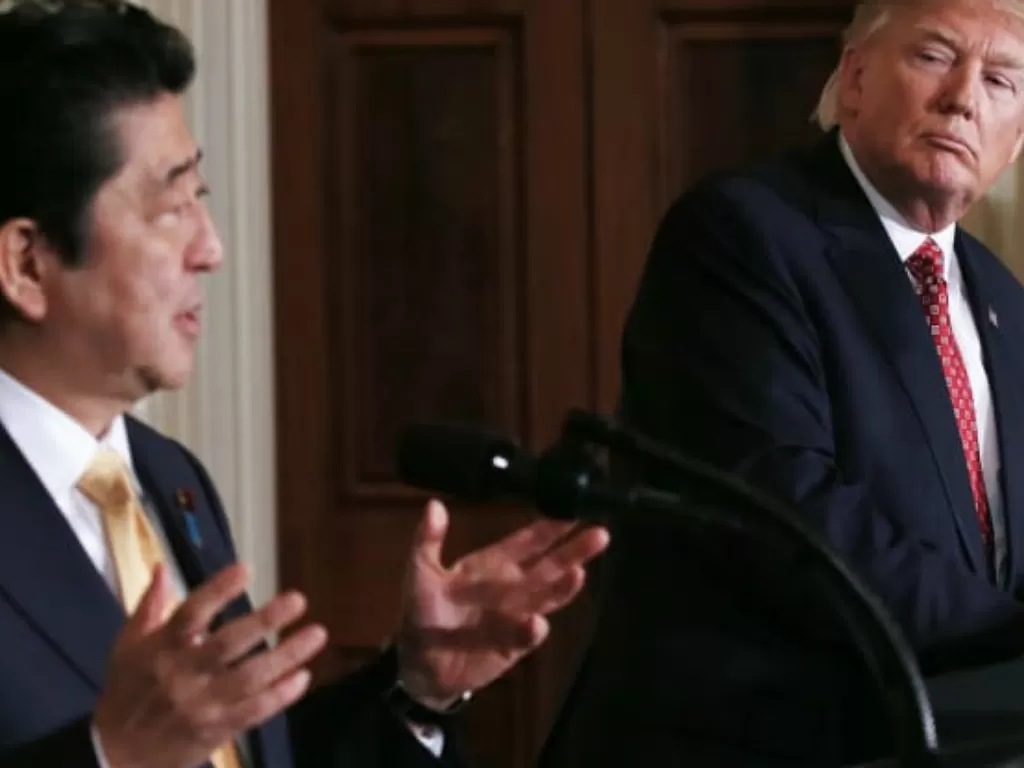 Perdana Menteri Jepang, Shinzo Abe dan Presiden AS, Donald Trump/Getty Images/Mario Tama