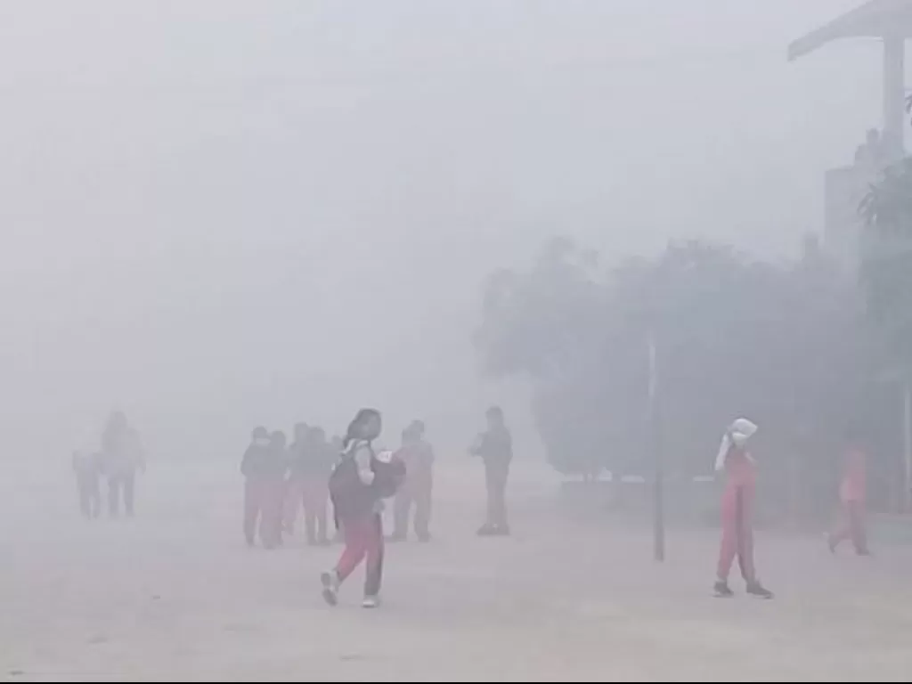 Kabut asap di Kota Sampit, Kabupaten Kotawaringin Timur. (Antara/Norjani)