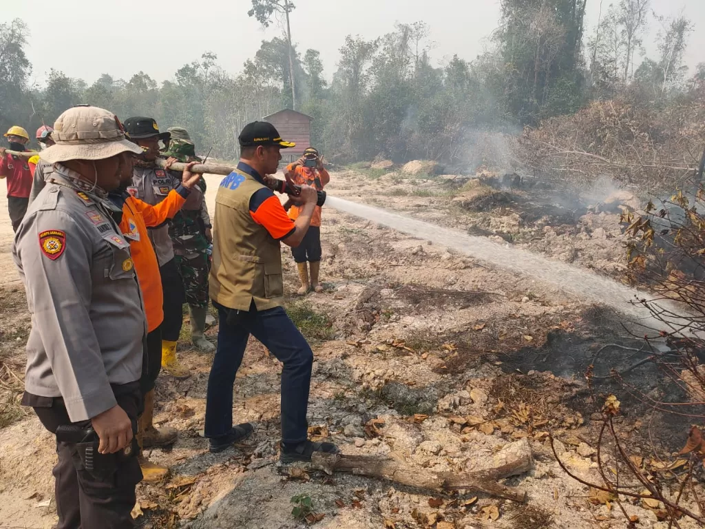 Kepala Badan Nasional Penanggulangan Bencana (BNPB) Doni Monardo melakuka pemantauan lapangan langsung kebakaran hutan dan lahan (karhutla) Rabu (11/9/2019)(BNPB)).