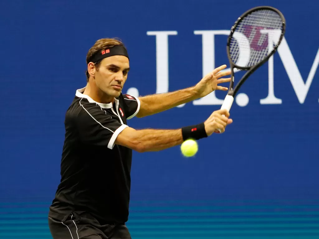 Roger Federer lakoni laga amal melawan Kei Nishikori di Jepang. (Geoff Burke/USA Today via Reuters)