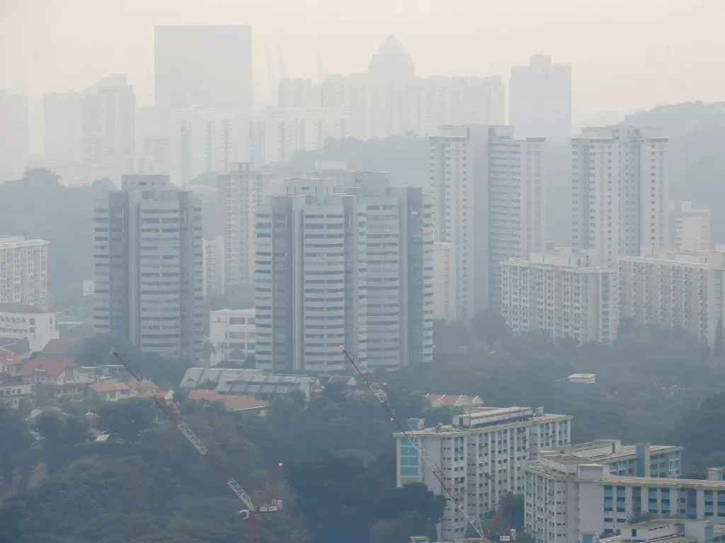 Kabut asap di Singapura membuat kualitas udara berstatus tidak sehat. (Reuters/Feline Lim)