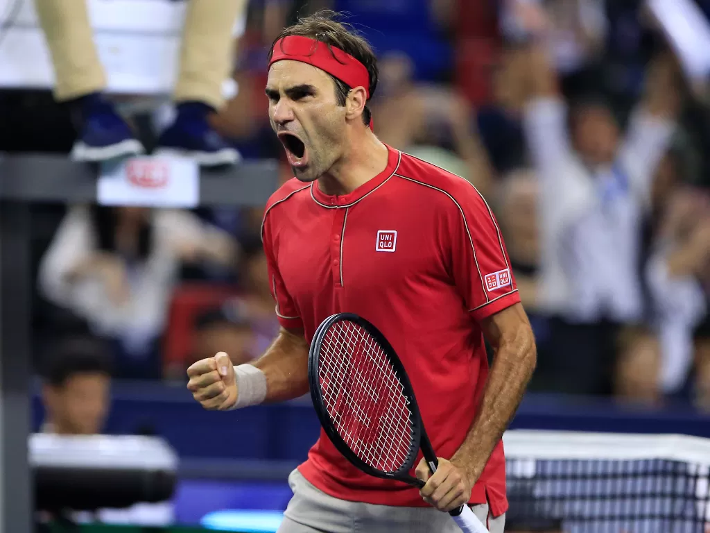 Roger Federer akhirnya memastikan diri tampil di Olimpiade Tokyo 2020. (Reuters/Aly Song)