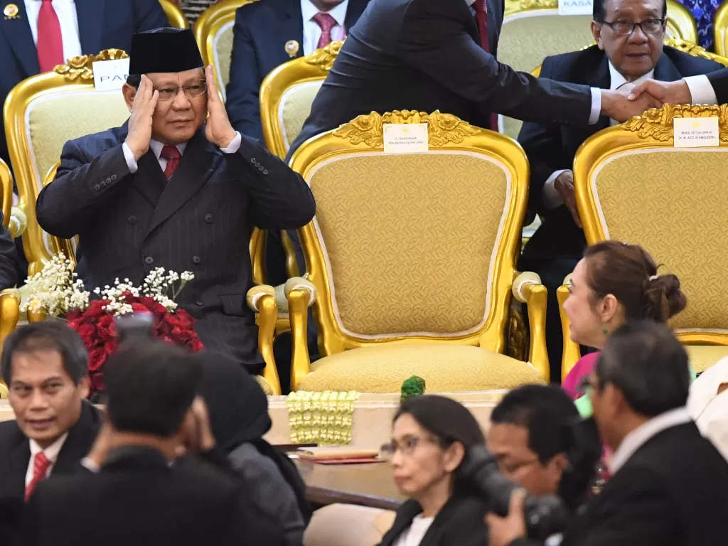 Ketua Umum Partai Gerindra Prabowo Subianto (kiri) menghadiri upacara pelantikan Presiden Joko Widodo dan Wakil Presiden Ma'ruf Amin. (Antara/Akbar Nugroho)