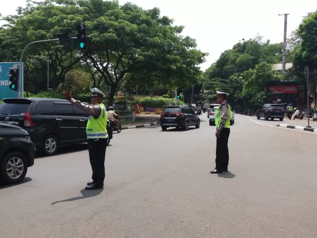 Aparat Kepolisian tengah amankan arus lalu lintas di Jakarta. (Polda Metro Jaya).