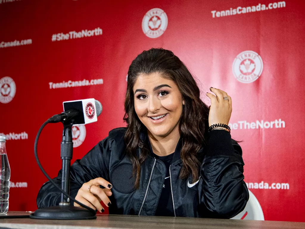  Pemain tenis Kanada Bianca Andreescu berbicara kepada pers tentang kemenangannya di AS Open, setelah tiba di Toronto, Ontario, Kanada 11 September 2019. photo/REUTERS/Carlos Osorio