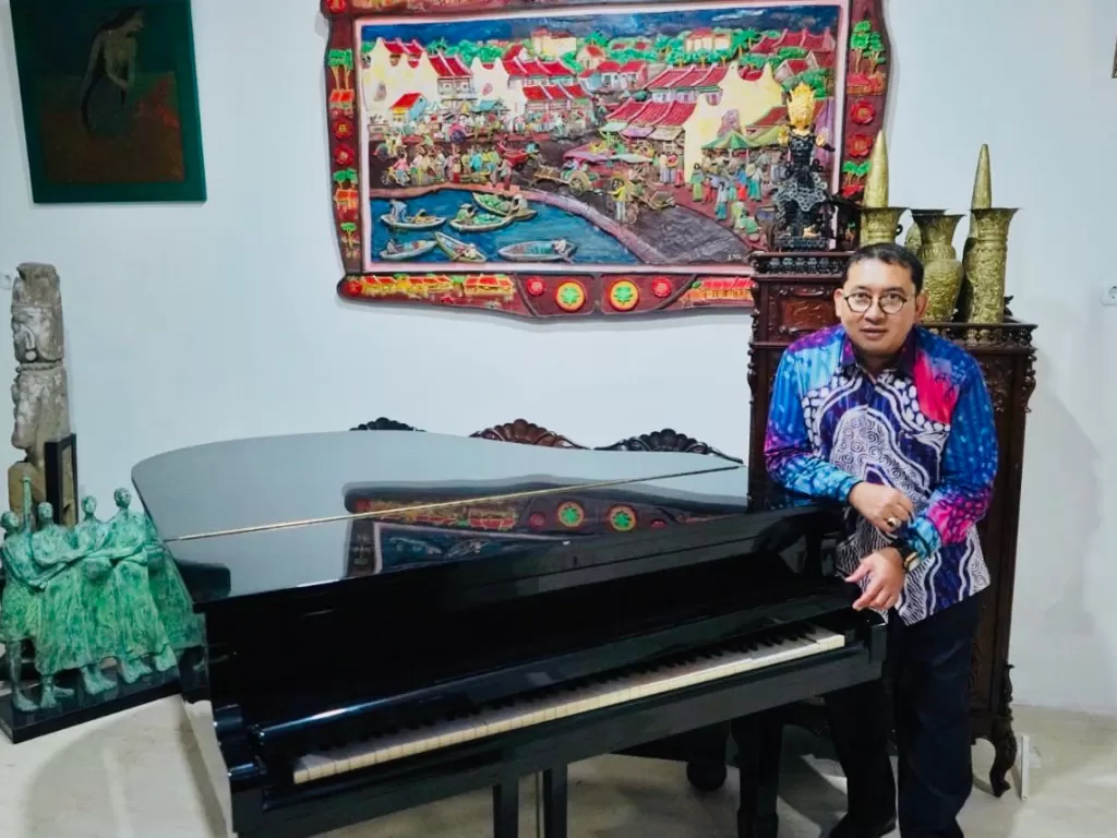 fadli Zon dan Pianonya yang berusia 100 tahun dan kebanjiran (Twitter/@fadlizon)