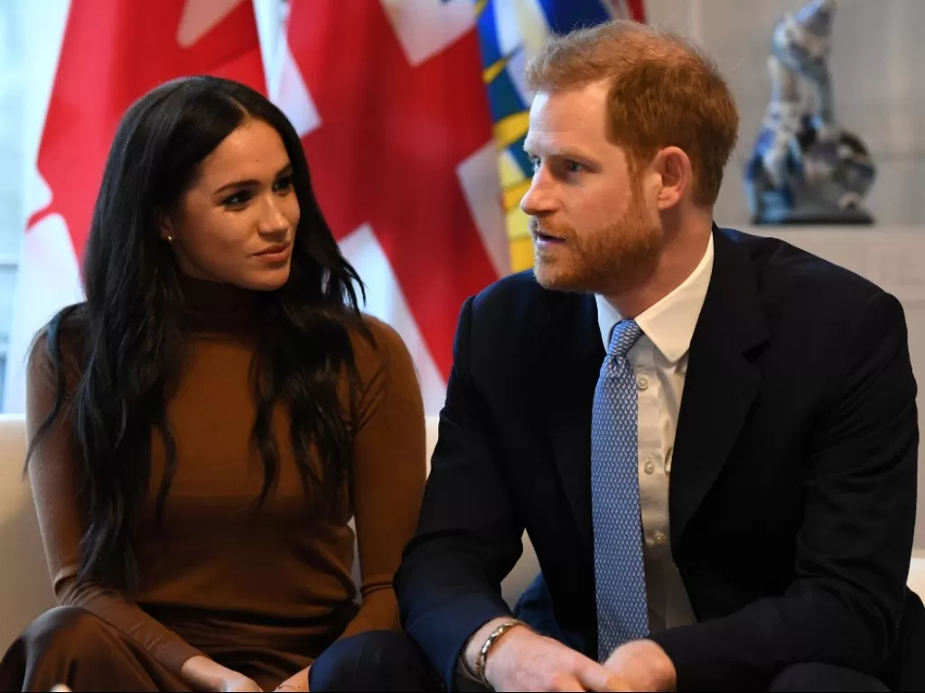  Pangeran Harry dan istrinya Meghan, Duchess of Sussex saat mengunjungi Canada House di London, Inggris, 7 Januari 2020. (REUTERS/Pool/Daniel Leal-Olivas)