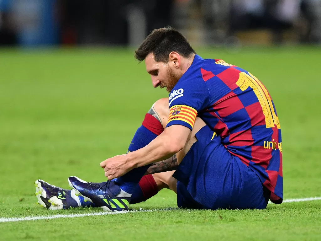 Lionel Messi saat bertanding di lapangan. (REUTERS/Waleed Ali)