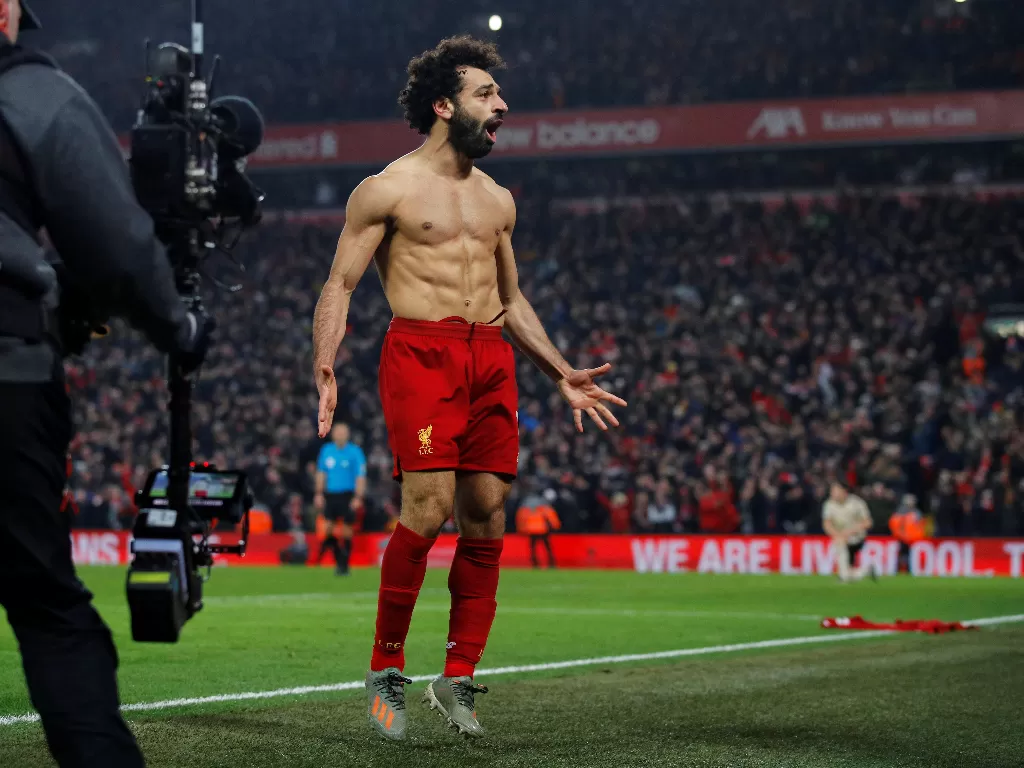 Mohamed Salah melakukan selebrasi usai mencetak gol ke gawang Manchester United. (REUTERS/Phil Noble)