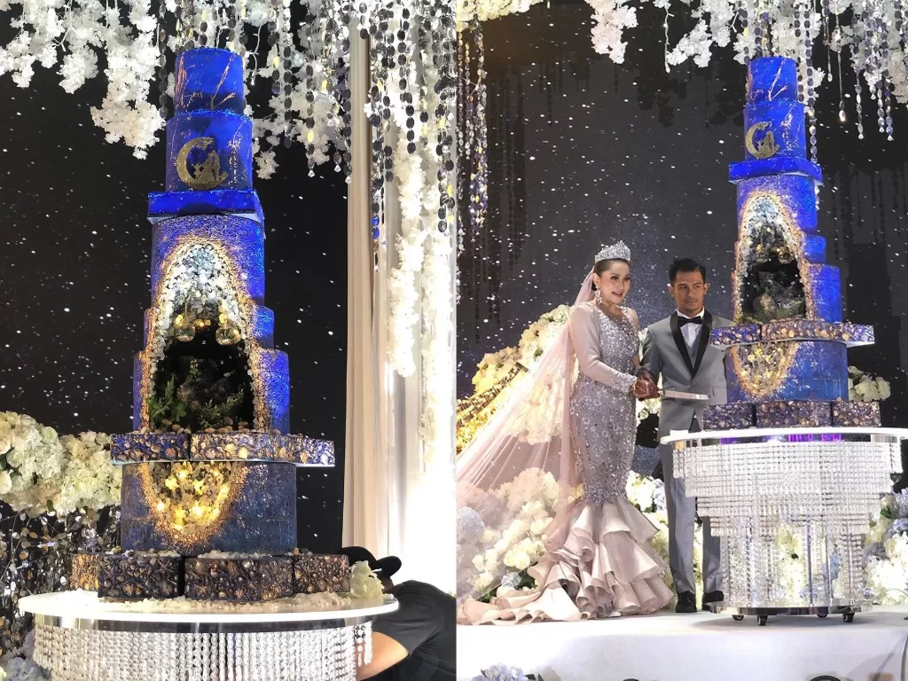Kue pengantin yang seolah bertema alam semesta. (Instagram/madaboutcake_official)