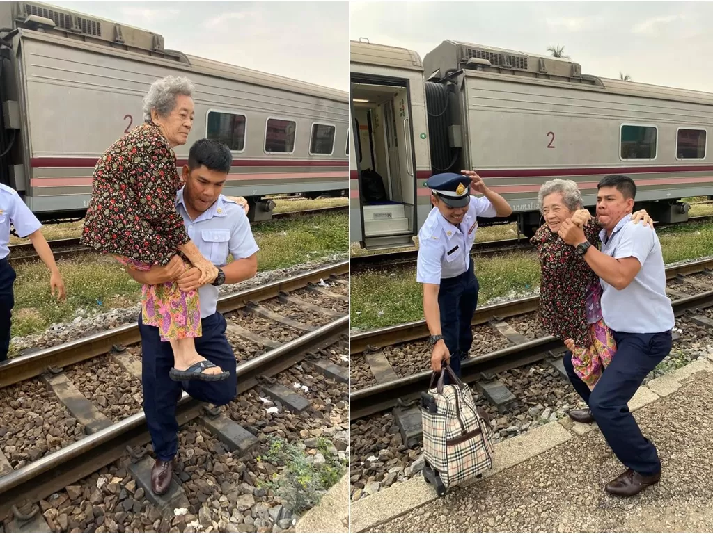 Seorang petugas kereta di Thailand menggendong lansia saat turun dari kereta untuk menuju peron stasiun. (Facebook/Pimchanok Praisuwan)