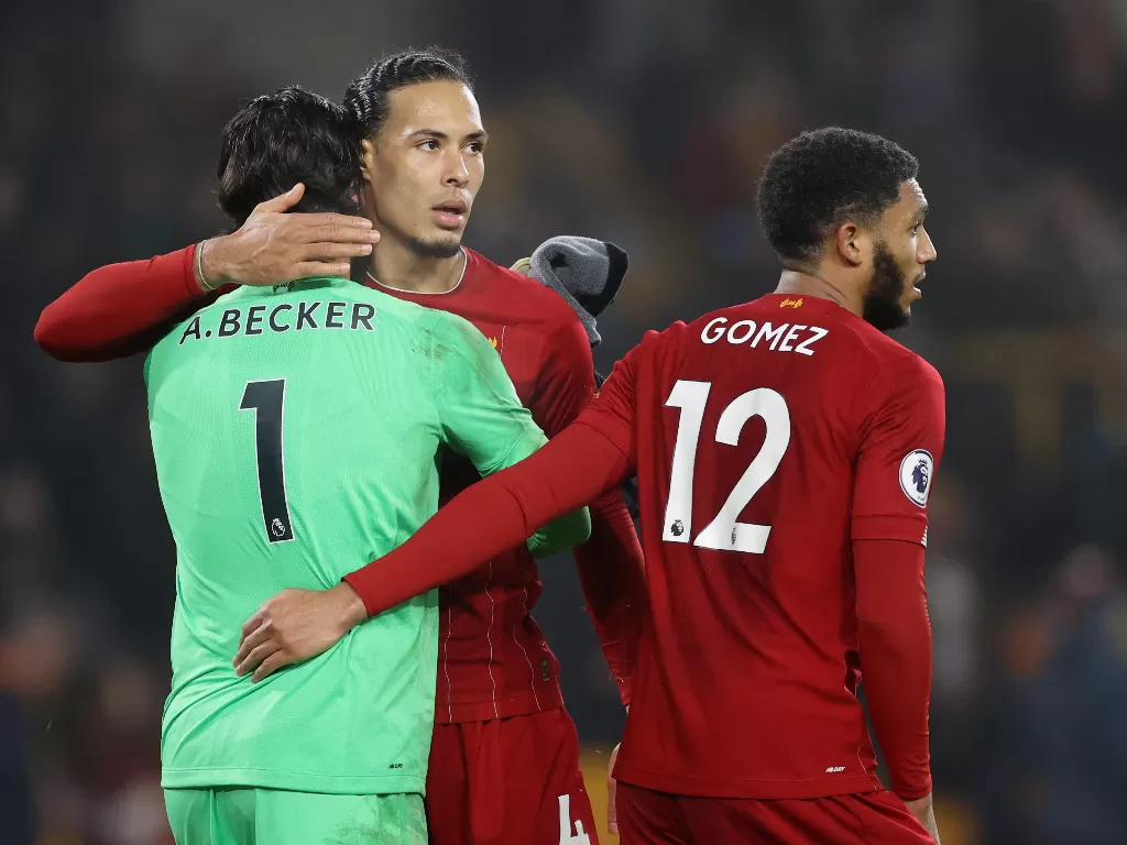 Para pemain Liverpool merayakan kemenangan atas Wolverhampton Wanders dalam lanjutan Premier League. ( Action Images via Reuters/Carl Recine)
