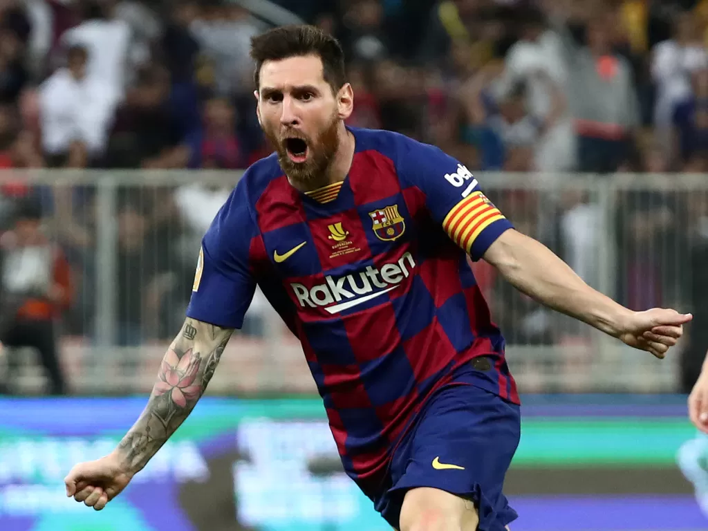 Selebrasi Lionel Messi usai mencetak gol di kompetisi Piala Super Spanyol. (REUTERS/Sergio Perez)