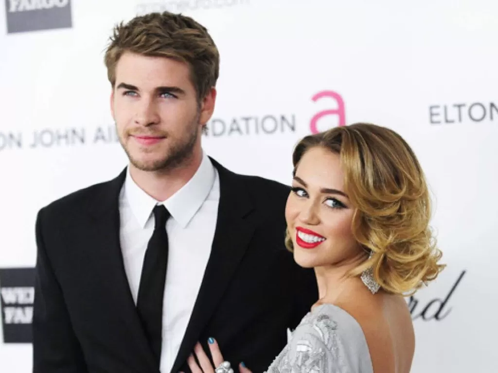 Liam Hemsworth dan Miley Cyrus. (REUTERS)