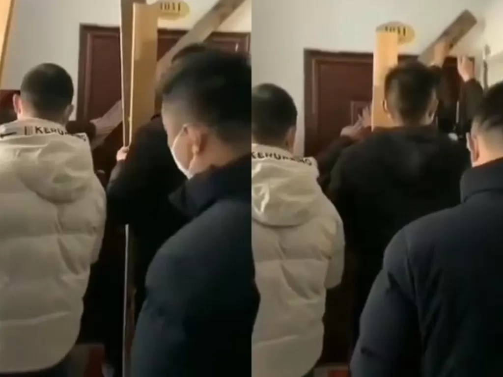 Pria di Wuhan dikurung keluarganya di dalam rumah karena baru pulang dari Wuhan (Screenshot)