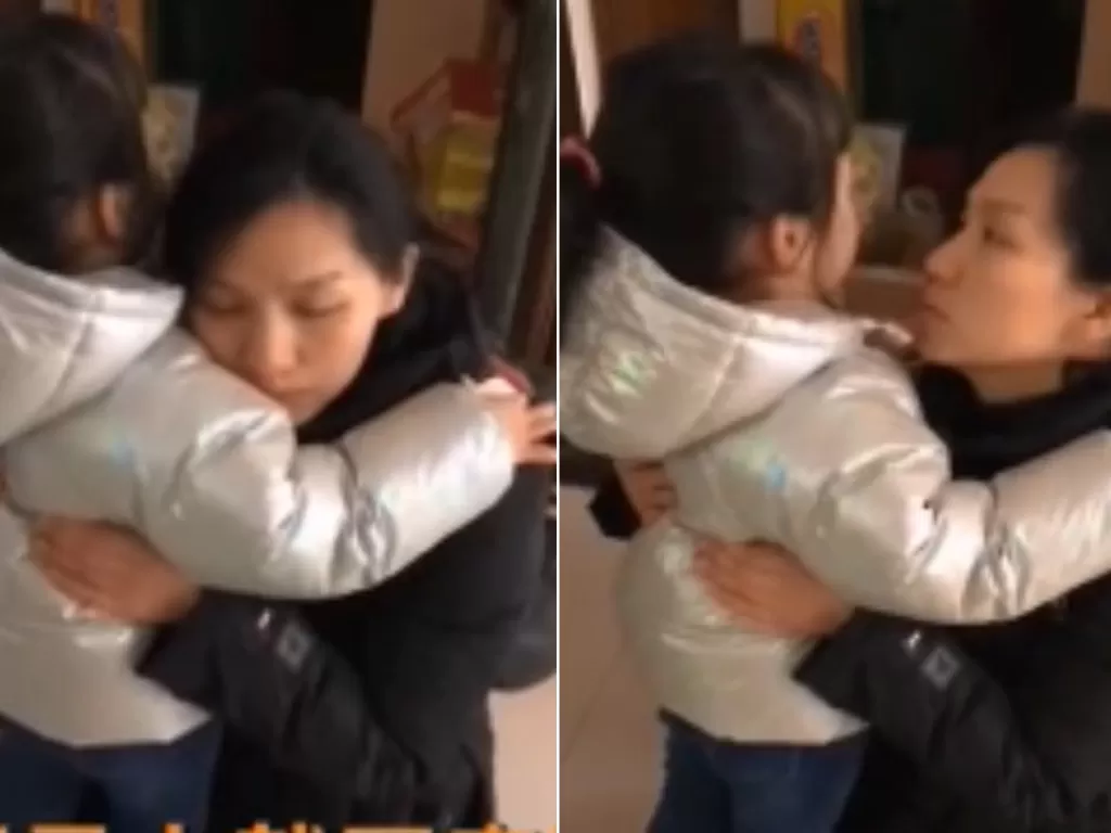 Momen haru saat seorang ibu bernama Zhang Min berpamitan kepada putrinya demi membantu korban virus korona di Wuhan (World of Buzz)