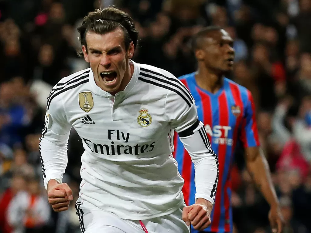Striker Real Madrid, Gareth Bale melakukan selebrasi usai mencetak gol. (REUTERS/Andrea Comas)