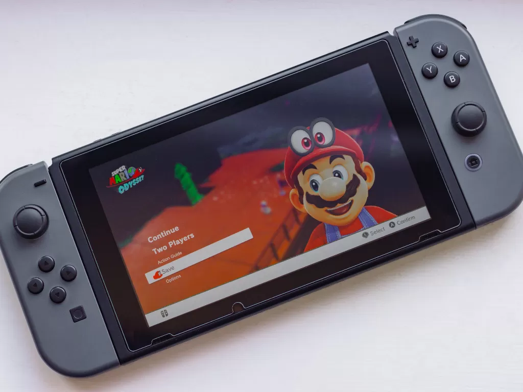 console Nintendo Switch (photo/Unsplash/Alex Holyoake)