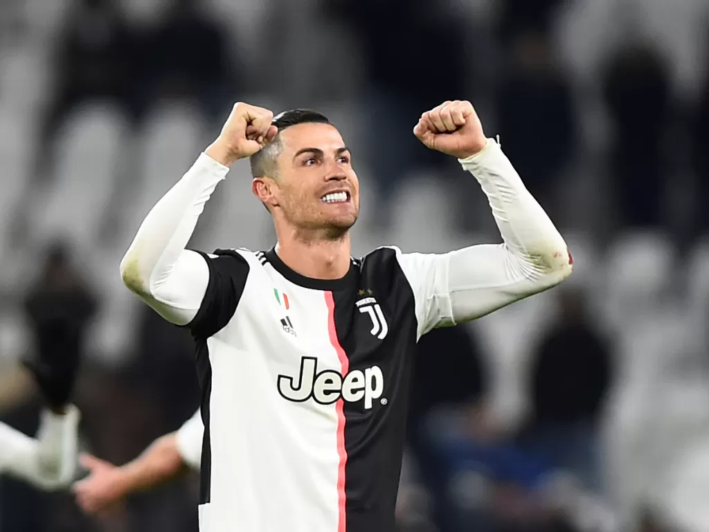 Ekspresi Cristiano Ronaldo usai mencetak gol. REUTERS/Massimo Pinca)
