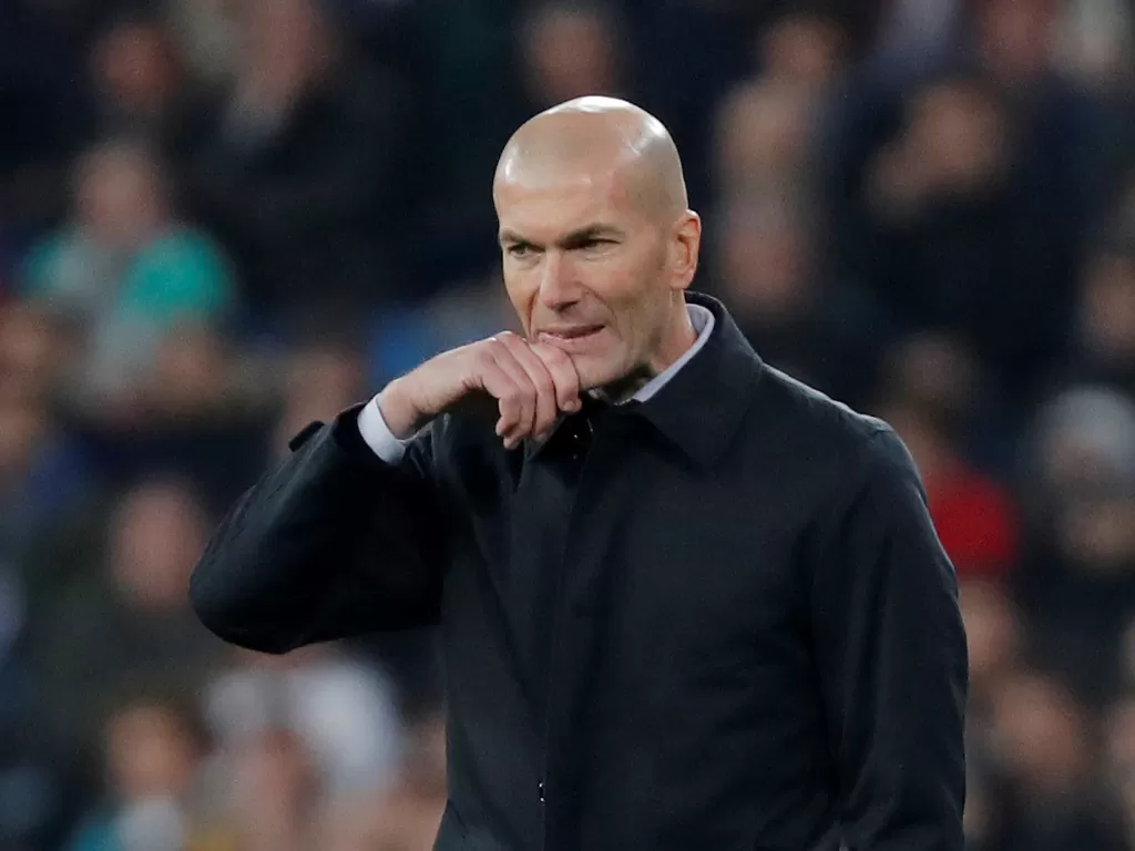 Zinedine Zidane kini mengungguli Jose Mourinho dalam daftar pelatih paling banyak mencetak kemenangan bersama Real Madrid. (REUTERS/Susana Vera)
