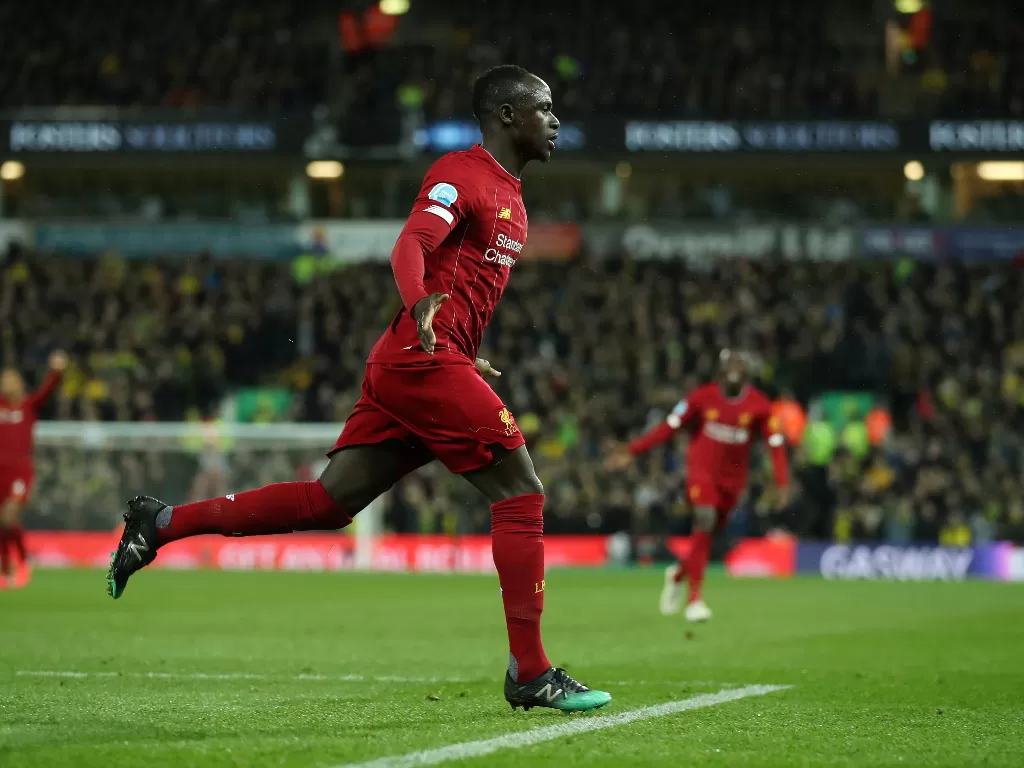 Sadio Mane melakukan selebrasi setelah mencetak gol ke gawang Norwich. (REUTERS/Chris Radburn) 