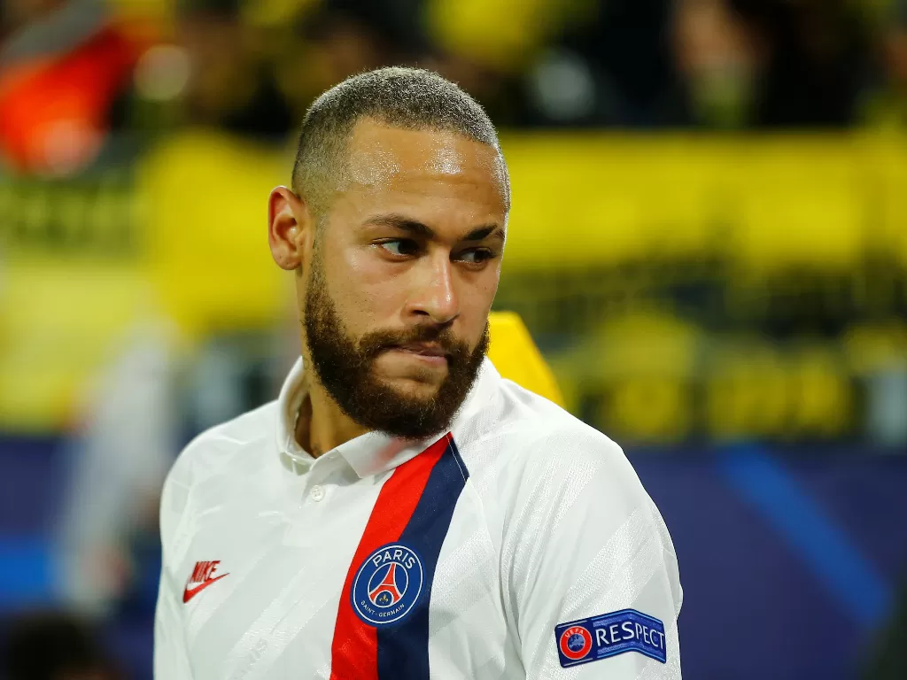 Penyerang PSG, Neymar ketika melawan Borussia Dortmund di leg pertama babak 16 besar Liga Champions. (REUTERS/Leon Kuegeler)