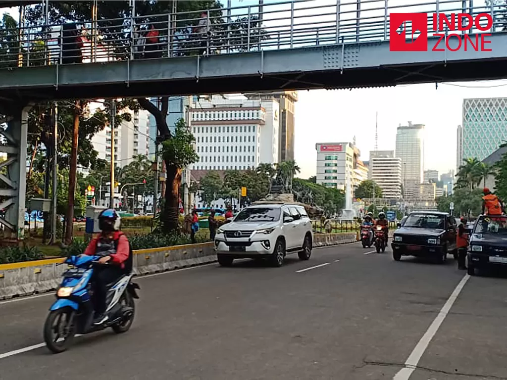 Demo PA 212 Selesai, Lalin di Jalan Medan Merdeka Barat, Jakarta Pusat dibuka. (INDOZONE/Samsudhuha Wildansyah)