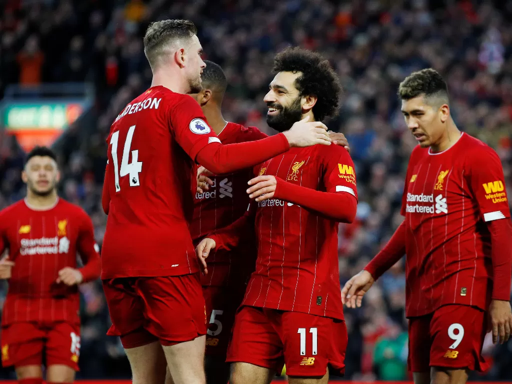 Para pemain Liverpool melakukan selebrasi usai mencetak gol. (REUTERS/Phil Noble)