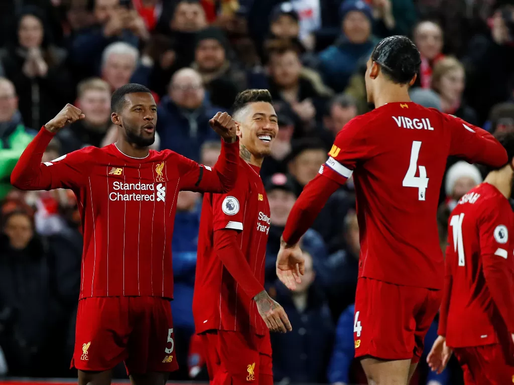Pemain Liverpool melakukan selebrasi usai mencetak gol. (REUTERS/Jason Cairnduff)