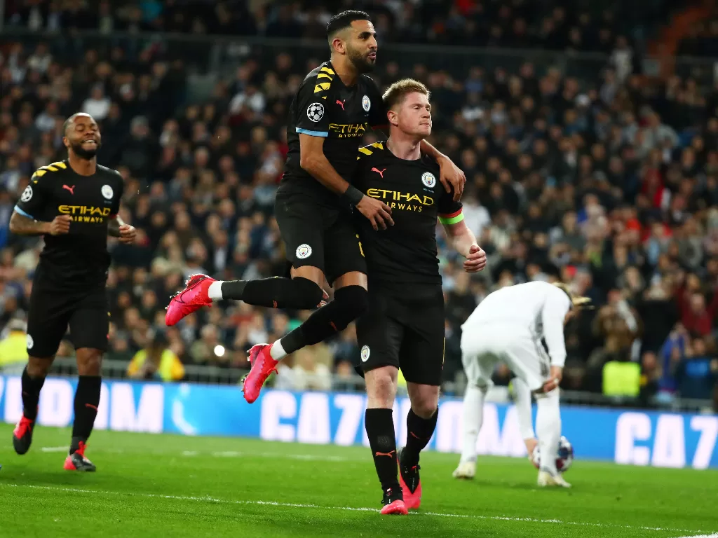 Pemain Manchester City melakukan selebrasi usai mencetak gol. (REUTERS/Sergio Perez)