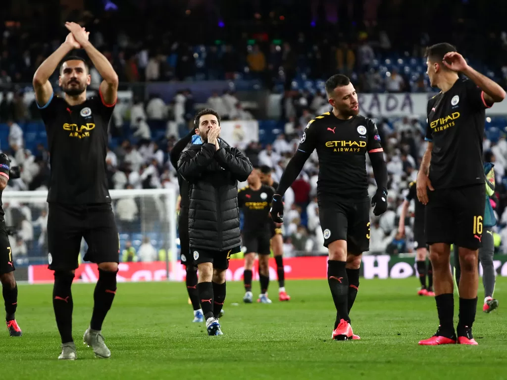 Pemain Manchester City merayakan kemenangan usai menekuk Real Madrid 2-1 dalam laga Liga Champions. (REUTERS/Sergio Perez)