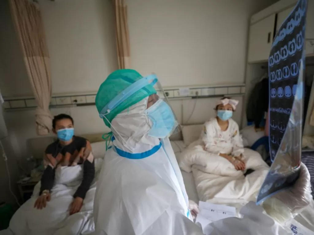Ilustrasi pasien terjangkit virus corona (China Daily via REUTERS)