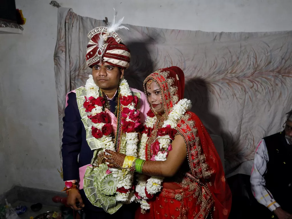 Savitri Prasad dan suaminya Gulshan (REUTERS/Adnan Abidi)