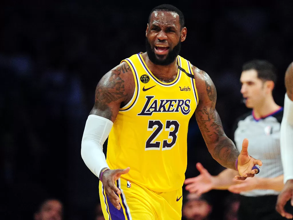 Pemain Los Angeles Lakers, LeBron James, enggan bermain jika pertandingan NBA digelar tanpa penonton. (USA Today via Reuters/Gary A. Vasquez)