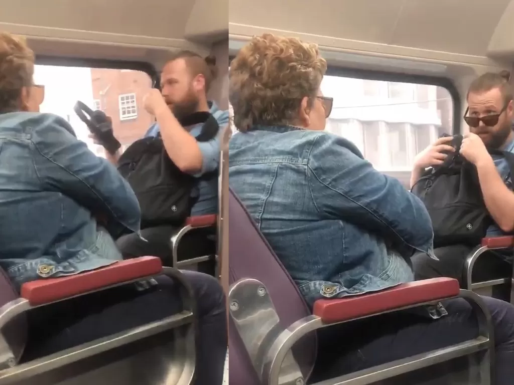 Seorang pria dan wanita bertengkar di Kereta karena khawitr virus corona. (photo/Twitter/@andy_park)