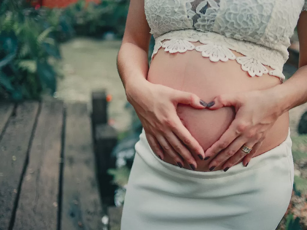 Ilustrasi  wanita sedang hamil (Pexels/Garon Piceli)