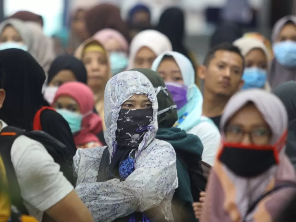 Ilustrasi masyarakat Indonesia pakai masker cegah penyebaran virus corona (ANTARA FOTO/Moch Asim).