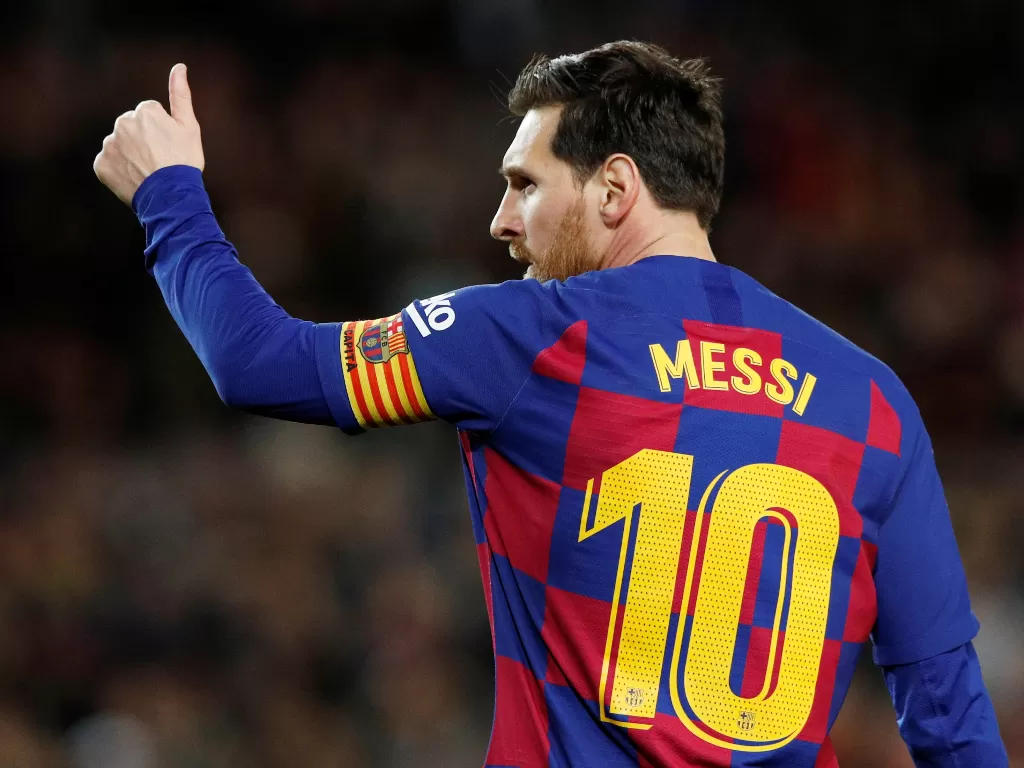 Lionel Messi kembali mengutarakan keinginannya bermain dengan Neymar di Barcelona. (REUTERS/Albert Gea)