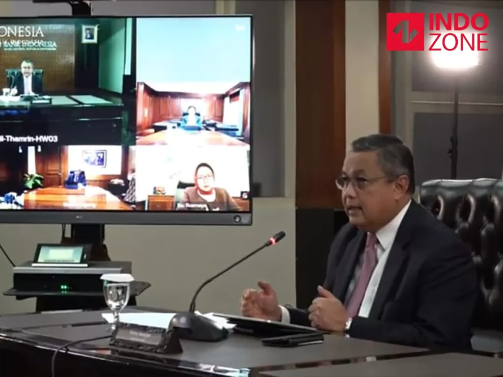 Gubernur Bank Indonesia Perry Warjiyo dalam video conference soal hasil RDG Bank Indonesia. (INDOZONE/Sigit Nugroho)
