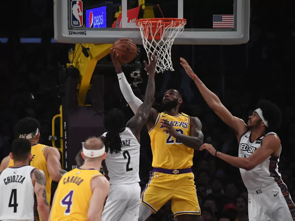 Pertandingan NBA antara Los Angeles Lakers Vs Brooklyn Nets. Beberapa pemain dari kedua tim dinyatakan positif virus corona. (USA TODAY Sports via Reuters/Richard Mackson)