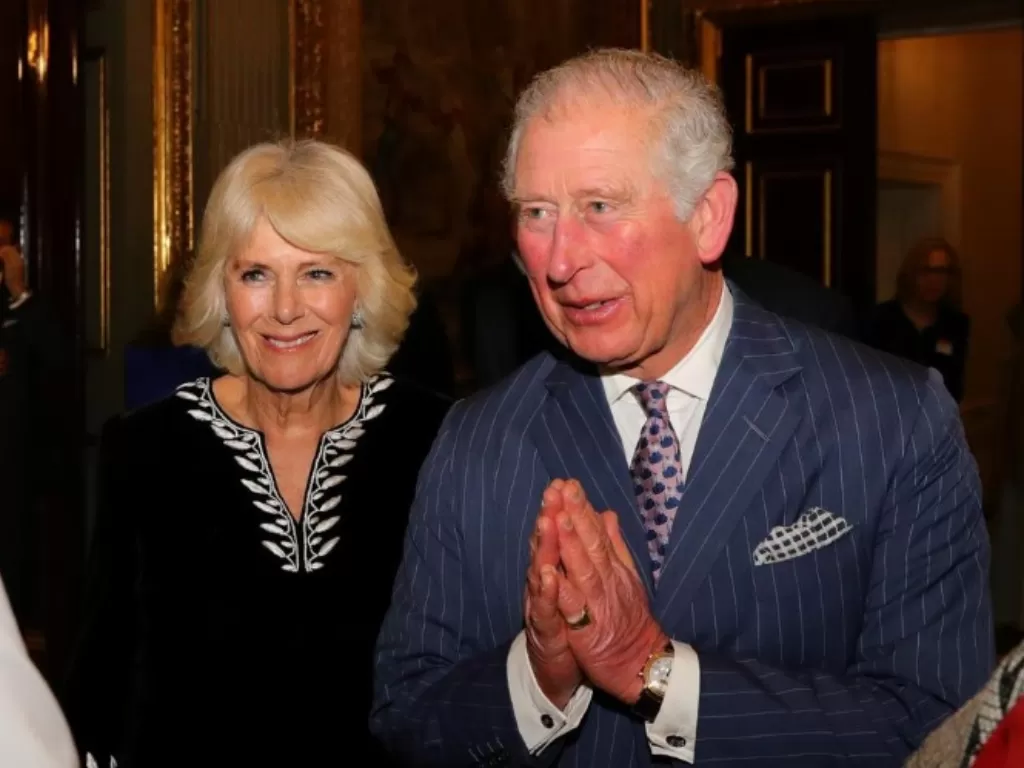 Pangeran Charles dan istrinya Camilla (REUTERS/Aaron Chown)