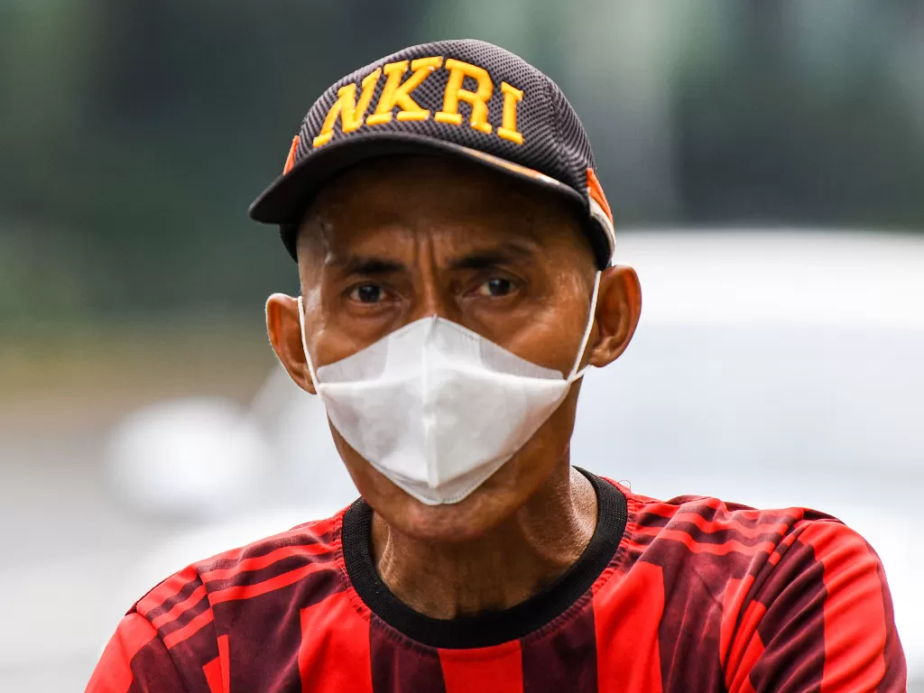 Warga menggunakan masker beraktivitas di Jakarta, Minggu (29/3/2020). (Photo/ANTARA FOTO/M Risyal Hidayat)