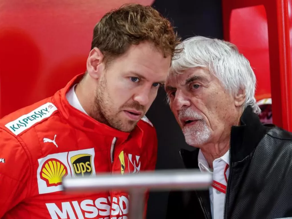Sebastian Vettel dengan Bernie Ecclestone. (marca.com)