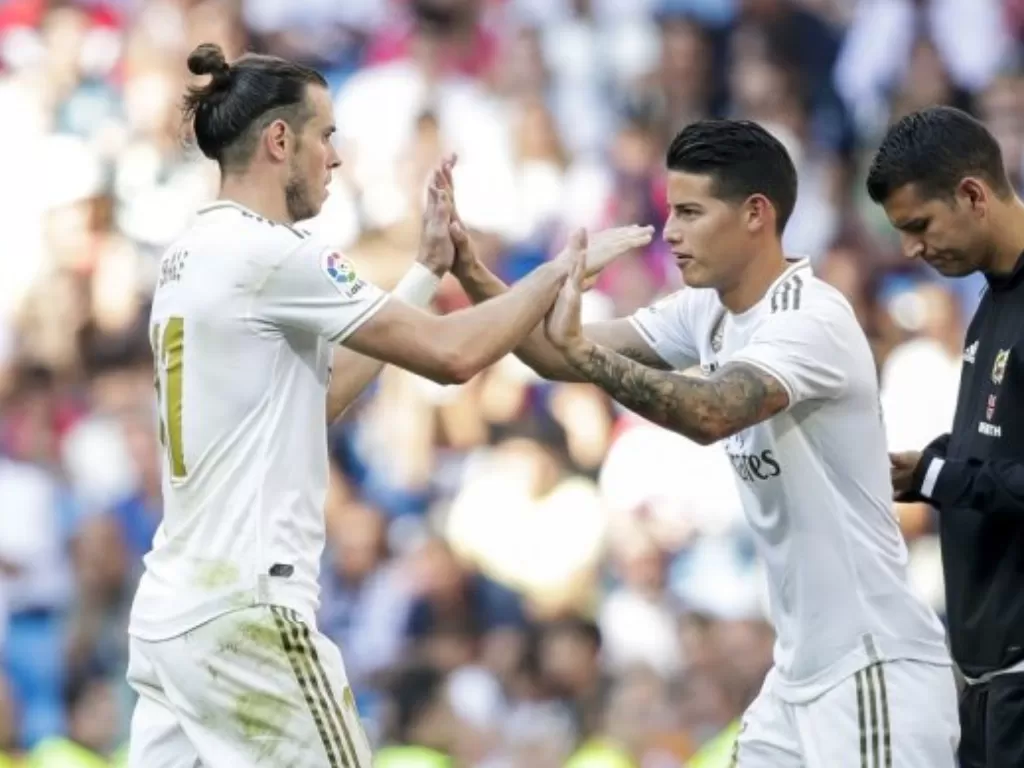 Gareth Bale (kiri) dan James Rodriguez (kanan) saat masih berseragam Real Madrid. (Twitter/@BBCSportWales)