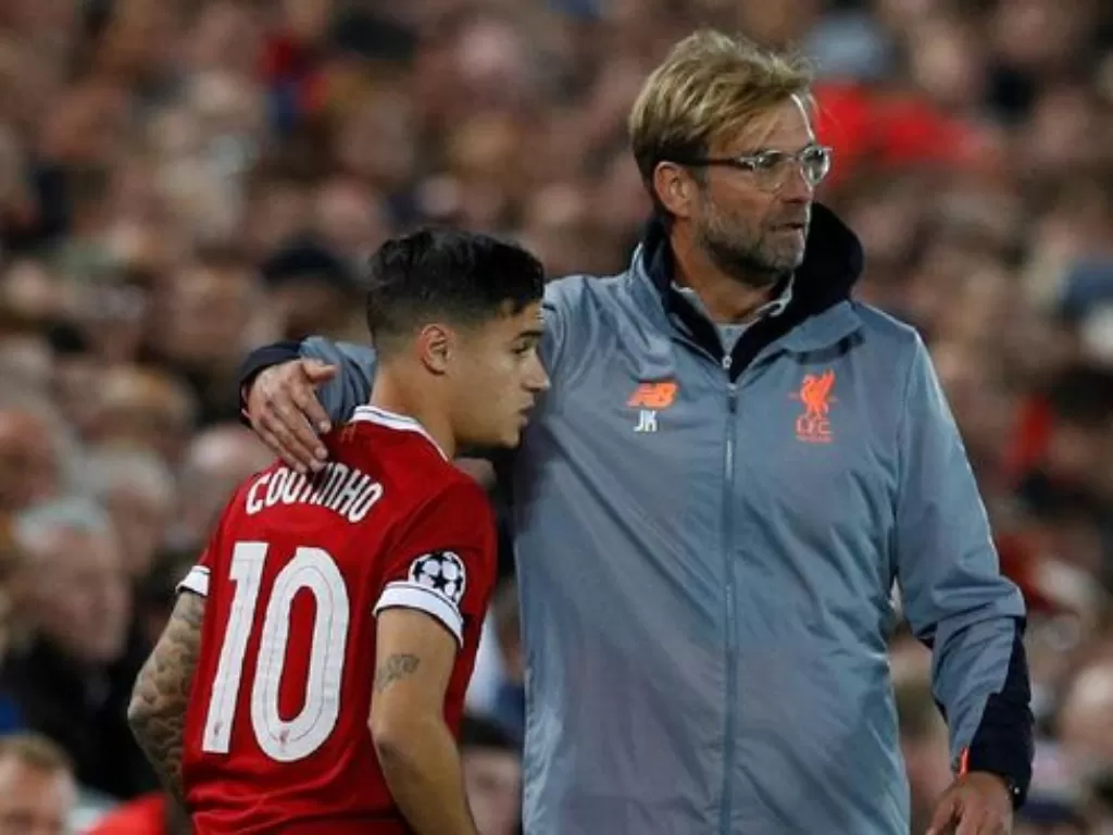 Pelatih Liverpool, Juergen Klopp dan Coutinho. (REUTERS/Phil Noble)